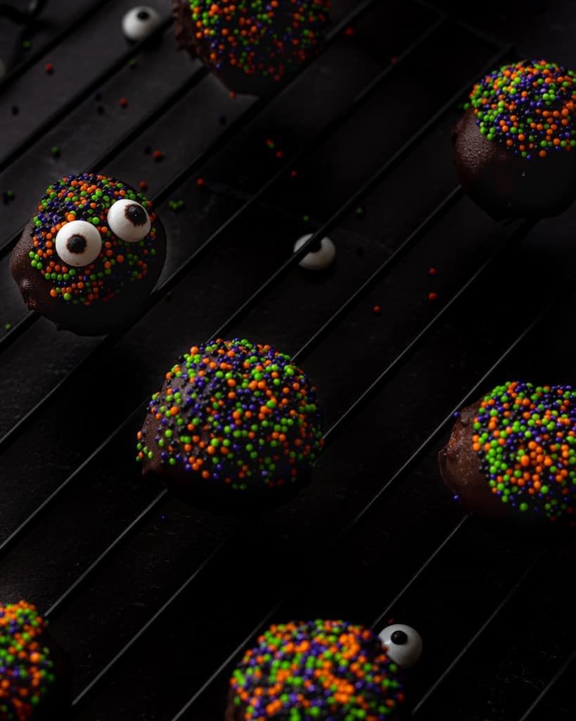 Halloween Chocolate Truffles on a dark background.