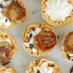 caramelized banana phyllo cups topped with chocolate flakes.