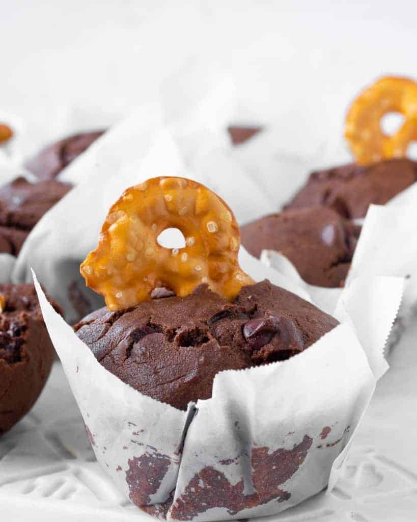 Baked double chocolate muffins topped with mini pretzels.