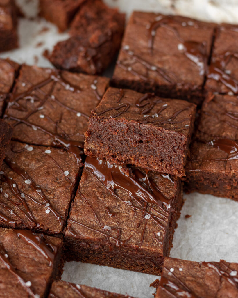 Photo of sliced brown butter brownie with crème de cacao, showing the fudgy texture.