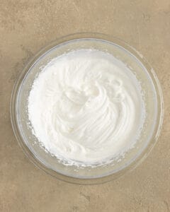 Photo of the homemade whipped cream in a bowl.