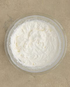 Photo of the mascarpone frosting in a large bowl.